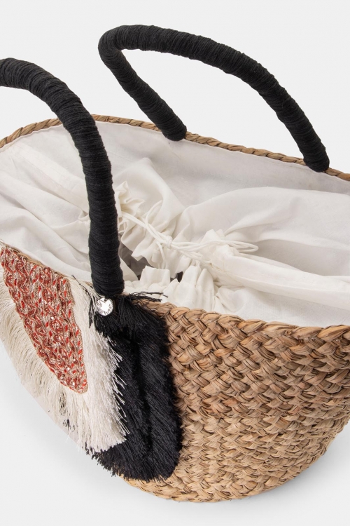 Wicker basket bag with black and white details